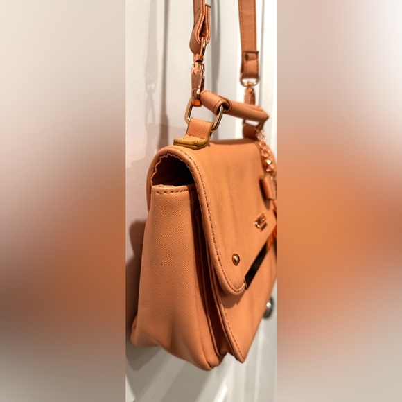 GUESS Peach Saffiano Crossbody Top Handle Bag w/ Bow Tassel & Long Strap - Picture 6 of 16